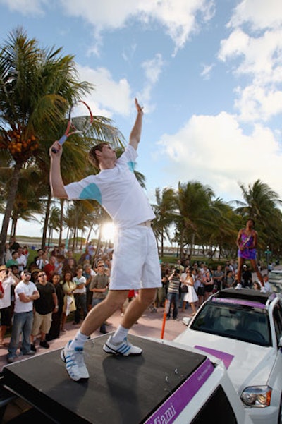 Andy Murray posed mid-swing for tournament photographers.