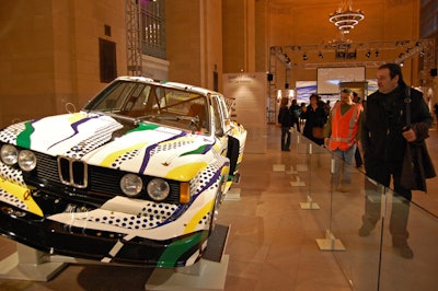 On one side of the hall, BMW mounted cars designed by Warhol, Lichtenstein, Rauschenberg, and Stella for public viewing.