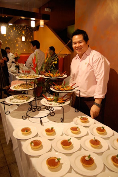 A server at the Asia Nine station offered guests cherry-infused sake and chevre-vegetable tarts.