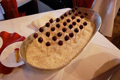 Chefs from Taberna del Alabadero made cherry-glazed foie gras lollipops.