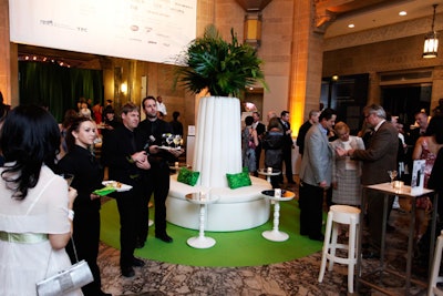 Green and white decor from Contemporary Furniture Rentals filled the venue.