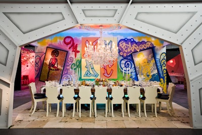 Michael Tavano designed a graffiti-inspired room for the New York Design Center, with art by Christian Avila and a contrasting formal dinner setting.