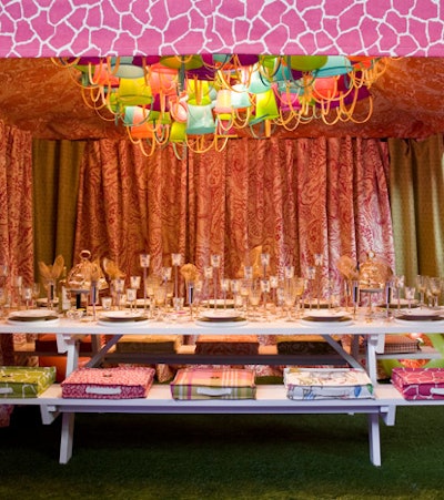 Kravet's tented table had a colorful seaside picnic setting, with inner tubes, sand buckets, and golden starfish accessories.