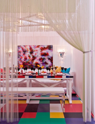 A string curtain enclosed the colorful dining lounge designed by Christopher Coleman and Angel Sanchez for Profiles.