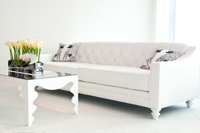 Tufted white seating dotted the space.