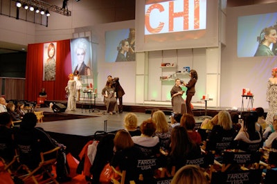 In one of the largest display areas, stylists for Farouk Systems demonstrated cutting techniques in front of an audience seated in branded directors' chairs.