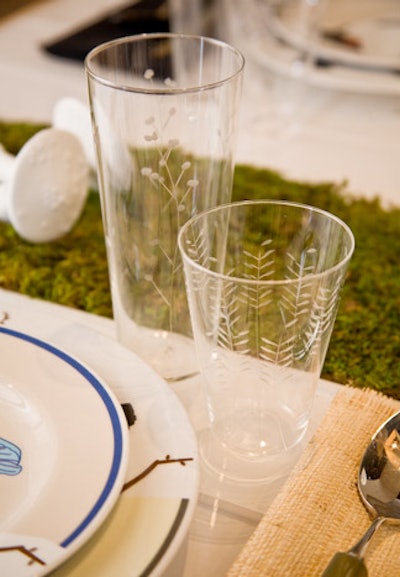 Eric Warner's table had etched tall and short glassware.