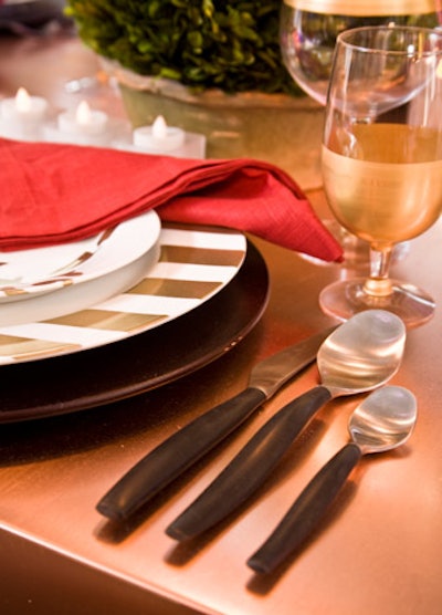 Marc Blackwell's place settings included flatware with a matte black finish.