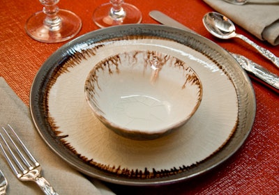 Alpha Workshops' table included hand-thrown plates by Alice Goldsmith Ceramics.