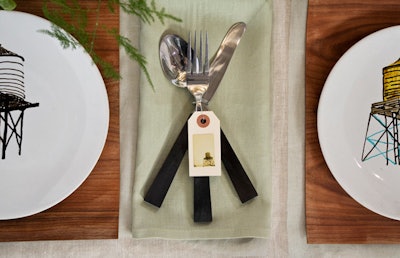 Faune Yerby used silverware with chunky black wooden handles.