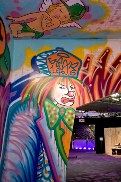 Artist Christian Avila created graffiti characters for the New York Design Center setting. A ninja symbolized AIDS as a silent killer and a frowning clown represented the seriousness of the disease.