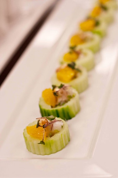Servers offered scallop ceviche on cucumber rounds to guests.
