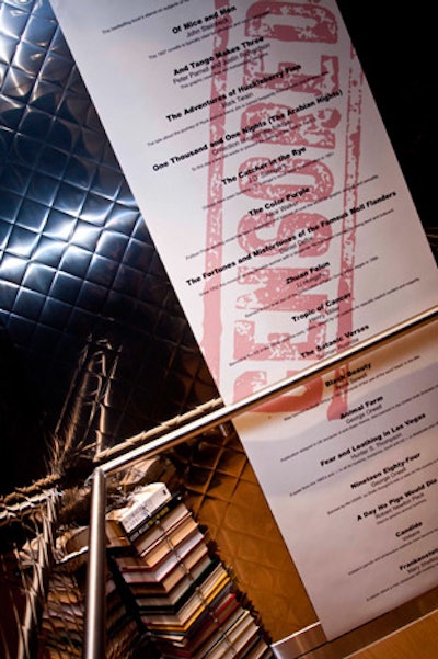 Event organizers chained a stack of books to the handrail in the elevator and covered a wall inside the lift with a poster listing titles of censored books like Of Mice and Men, and The Colour Purple.