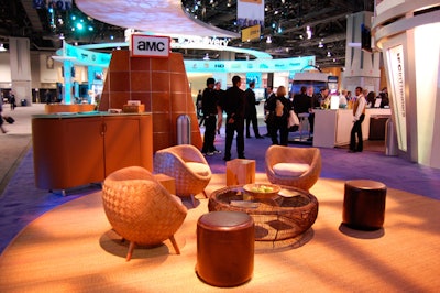 The AMC display included a cozy living room, complete with a wooden floor and rattan furniture.