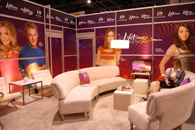 The huge Lifetime Networks booth had a pink and purple exterior with a plush, white living room-style interior.