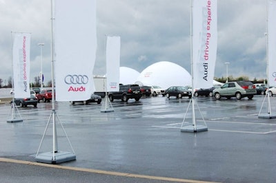 Corporate banners lined the entrance to the indoor-outdoor event.