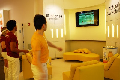 In one of the room's colorfully delineated areas, VitaminWater has a Wii gaming area set up for guests to start burning calories.
