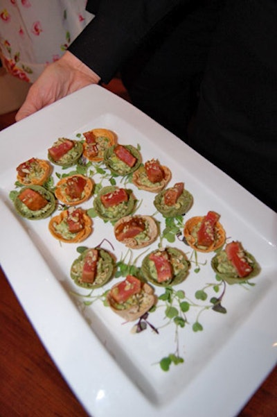 Limelight Catering provided hors d'oeuvres such as ahi tuna served over guacamole in mini tortilla shells.