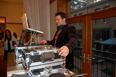 DJ Corey Sanford spun upbeat songs like Estelle's 'American Boy.'