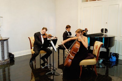 Three musicians from the orchestra performed during the cocktail reception.