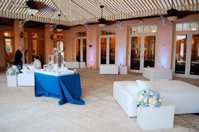 On the terrace, Fabulous Linen supplied white end tables and large beds for the lounge, which featured a jewel-shaped ice sculpture from So Cool Events.