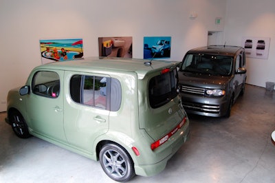 Nissan parked two Cubes inside the gallery to demonstrate the cars' accessories and features during the morning seminars.