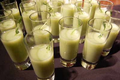 Servers passed hors d'oeuvres such as cucumber yogurt shooters from Cravings Fine Food Market & Catering.