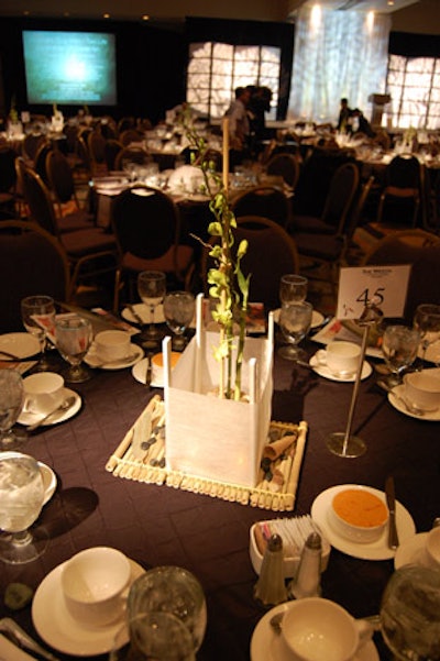 Volunteers used rocks, paper lanterns, and greenery to make centrepieces for the dining tables.