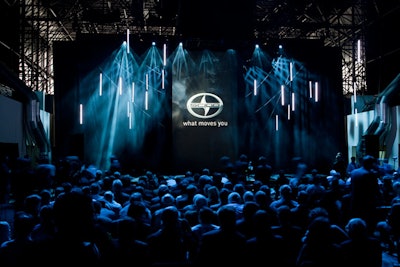 Attendees at Scion's Wednesday press conference entered a darkened room lit only by dangling neon tubes and blue lighting.