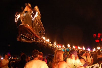 A fire-breathing serpent was one of the more eye-catching—and heat-generating—art installations at the Coachella festival on the Empire Polo Field in Indio.