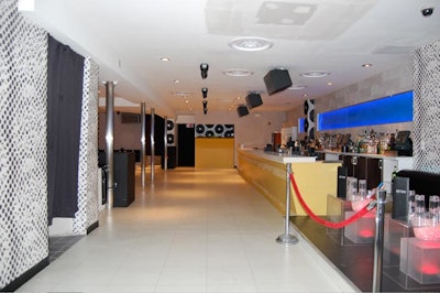 In addition to a DJ booth, Stir's audiovisual tricks include seven rotating ceiling LED lights and a smoke machine.