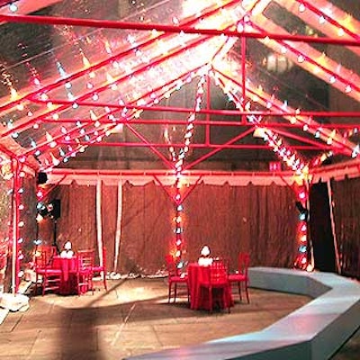 The Whitney Museum of American Art's downstairs patio was covered with a clear tent decorated with colored lights for the cocktails portion of the museum's fall benefit.