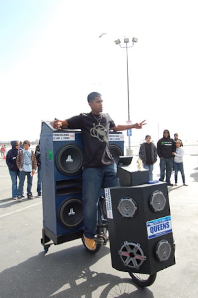 A DJ on wheels blared tunes for the crowd.