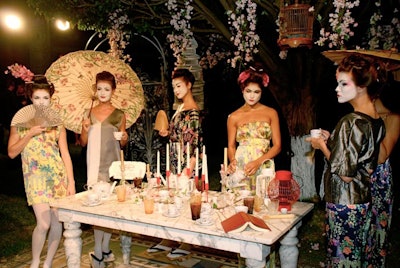 The models in Estrada's vignette wore Japanese geisha-style makeup and hairstyles and posed for pictures with paper parisols and fans.