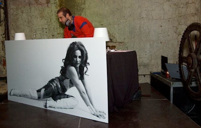 An oversize black-and-white image of Barbarella fronted the DJ booth.