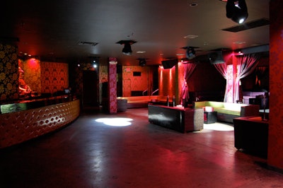 The private French Boudoir room has its own bar, DJ booth, and curtained V.I.P. area.