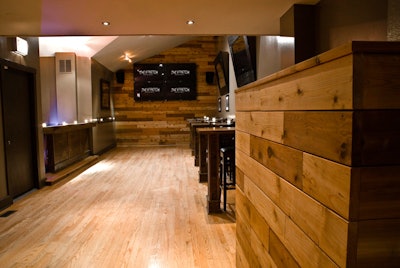 Cedar planks line the walls and the DJ booth.