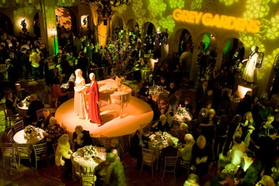 In the Roosevelt lobby, bright lights and mannequins wearing silk dresses from the film were meant to evoke the Beales' more prosperous times in the 1930s.