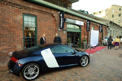 Two Audis with Bang & Olufsen sound systems sat outside the Hästens showroom in the Distillery District.