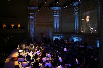 YouTube also used the back of the stage to play small documentaries about the different performers, share video testimonials from musicians such as Yo-Yo Ma, and offer close-ups of some of the soloists.