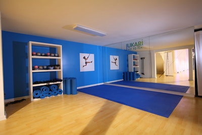 A separate area of the pop-up is used as an additional exercise space.