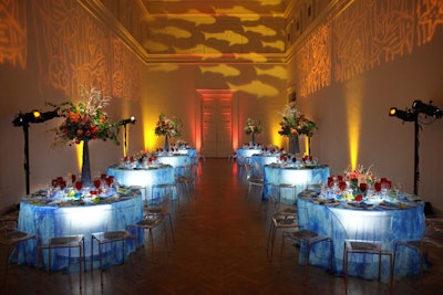 Gallery 18, one of the dining rooms for the younger patrons, got an underwater feel from gobos of sea life on the walls. Tie-dye-style blue linens covered white plastic tables uplit by Light-Olutions.