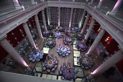 Strings of glass balls hung in the purple-lit Atrium space, where the table settingsranged from deep blue to aquamarine.