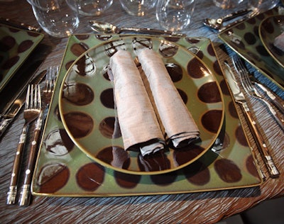 Perfect Settings' polka-dotted square and round plates also made an appearance in the Atrium, alongside wood-trimmed stemware and stemless Riedel glasses.