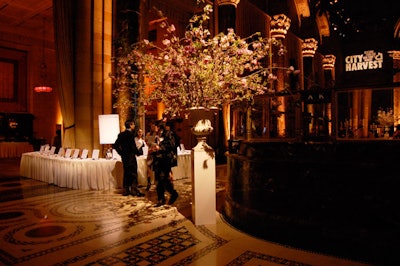For the evening benefit, City Harvest relocated floral arrangements from the stage to the Cipriani foyer.