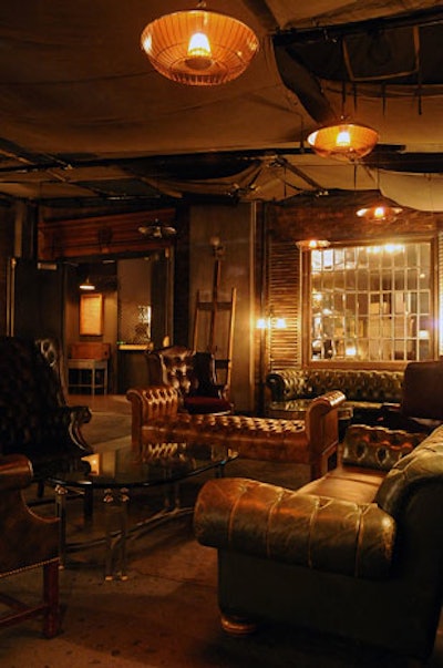 Vintage furniture and dim lighting create a speakeasy vibe at H.Wood.