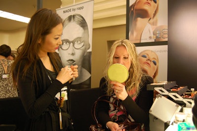 Attendees at the second annual Elle Show received touch ups at a display sponsored by Yves Saint Laurent.