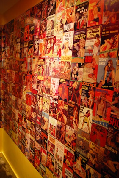 Custom wallpaper made with images from pulp fiction book covers decorates the hallway outside the restrooms.