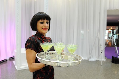 Fifteen women wearing identical black wigs and dresses offered cocktails such as the Telus Belvedere Kiwitini and the LG Belvedere Dare to guests at the reception.