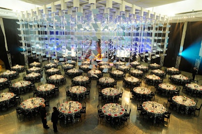 The 450 dinner guests dined on a meal prepared by chef Susur Lee in the Great Hall beneath 'Cloud,' a work of art by David Rokeby.